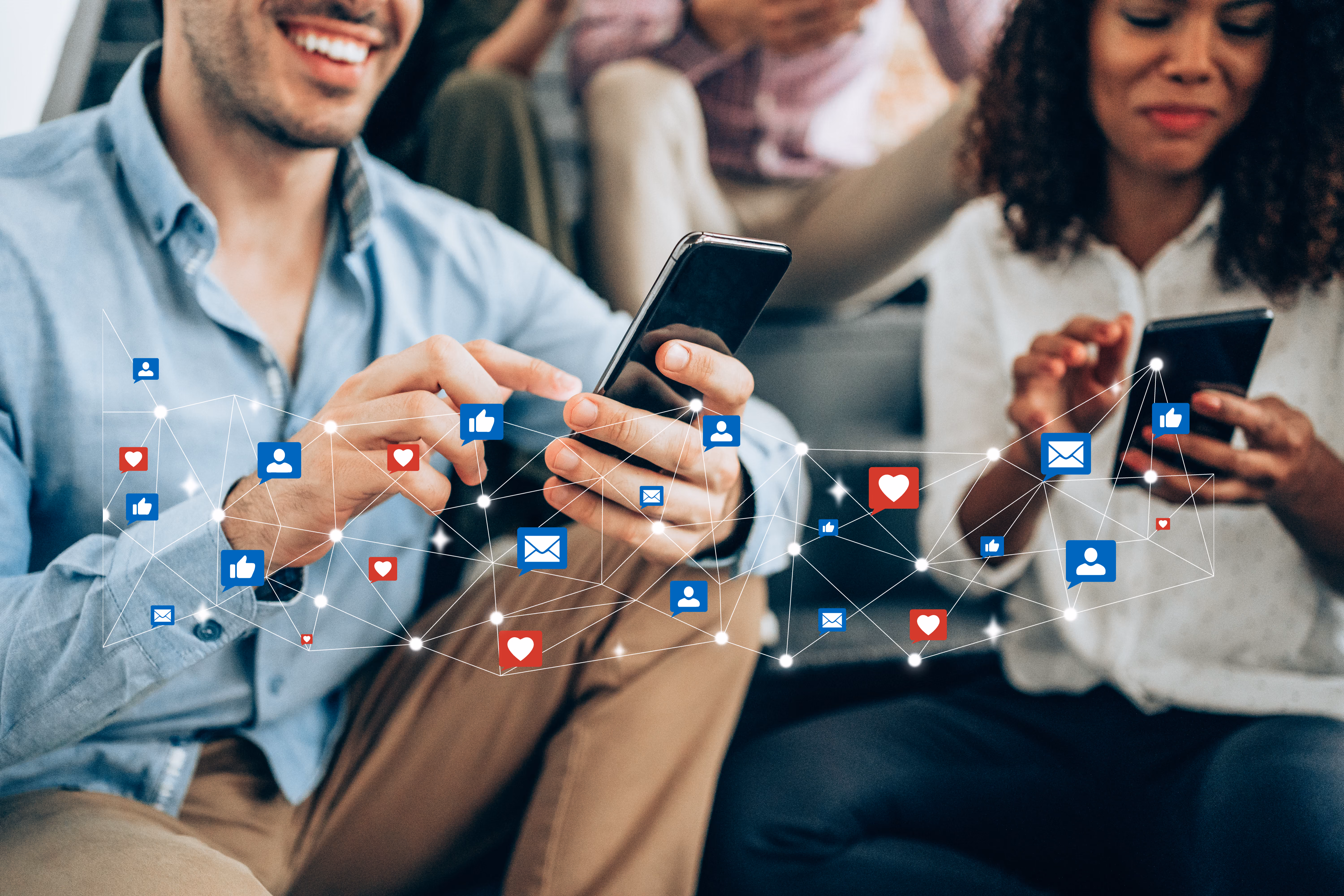 Young professional using social media mobile apps on smart phone