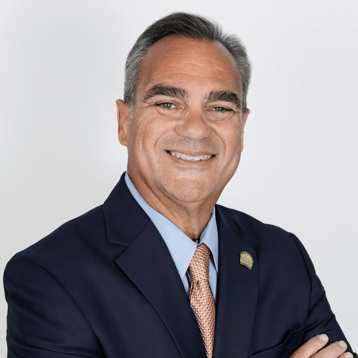Headshot of Rei Mesa, President and CEO, BHHS Florida Realty